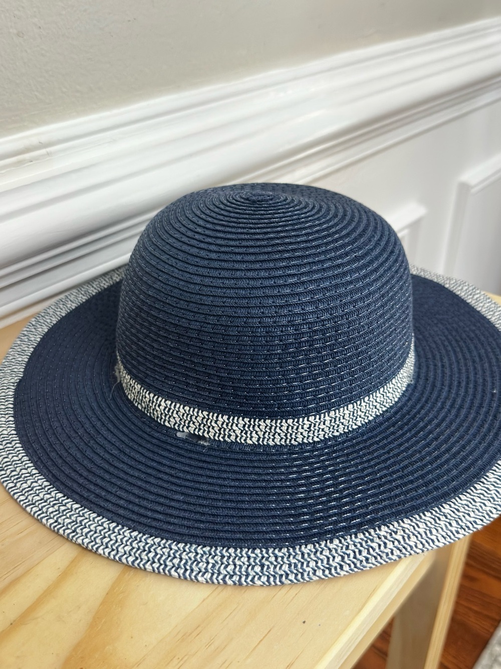 Woman stylish, navy blue and silver, sun hat
